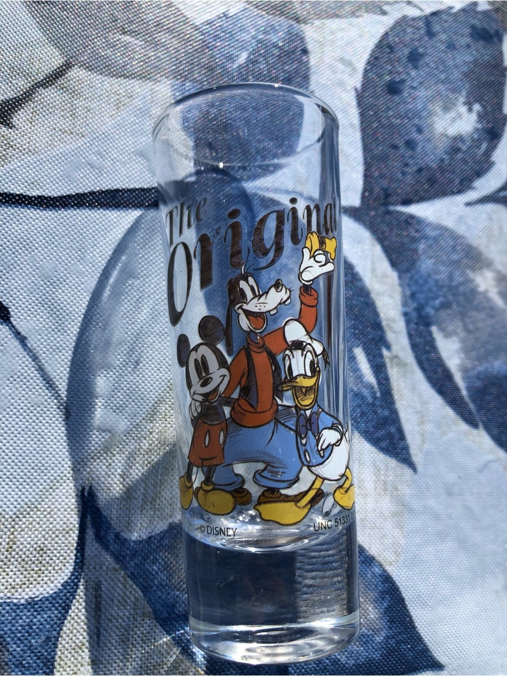 Micky mouse vintage glass,three Dr Seuss books,Stanley Tucci book all perfect